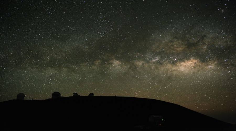 Telescopes observe the Milky Way. These are on Mauna Kea, Hawaii; one of the best astronomical sites in the world