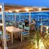 Tavoli sulla spiaggia