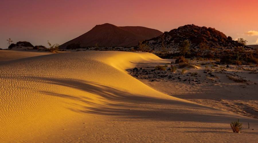 vista panoramica del tramonto sulle dune di sabbia, Corralejo